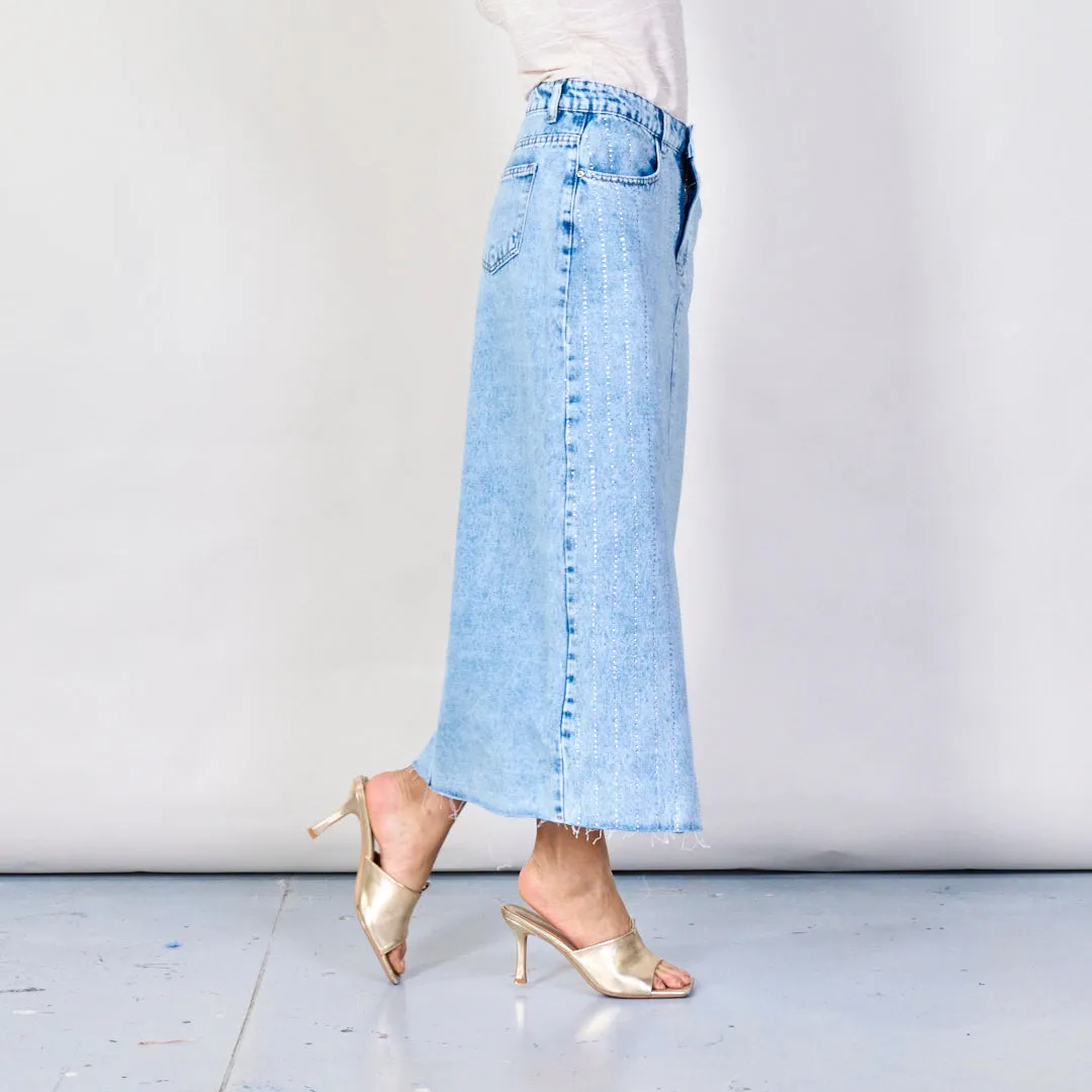 Distressed midi denim skirt with front slit wholesale